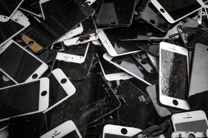 Pile of phones with cracked screens