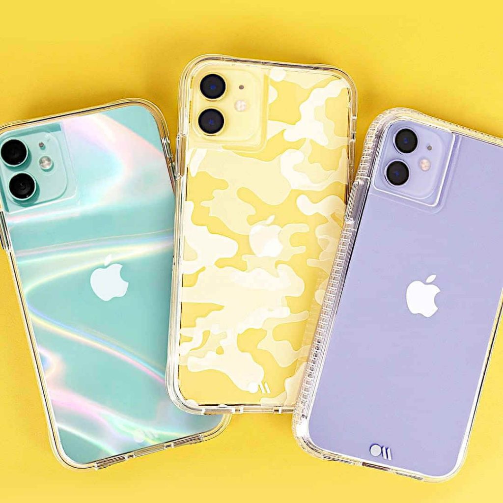 Three stylish phone cases (irisdescent, camo and clear) set against a yellow background
