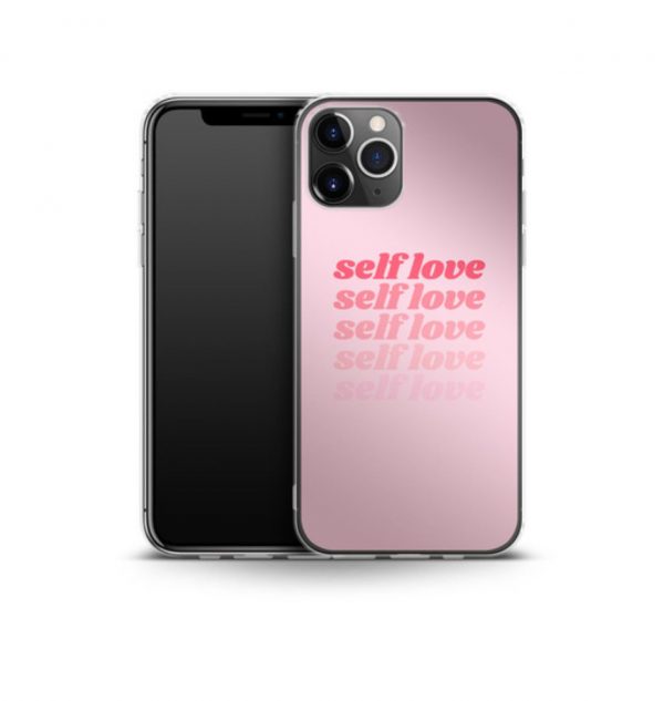 Pink phone case with the words ´self love´ printed multiple times in red (silicone)