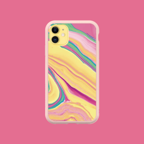 Yellow marble phone case set against a pink background